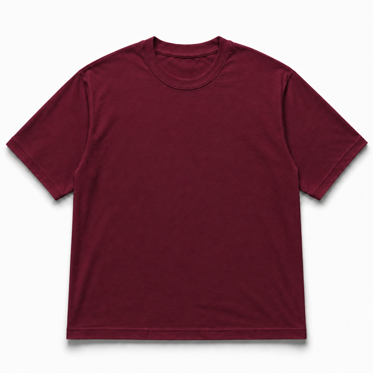 HexaStudios oversized T-shirt in soft fabric, featuring a relaxed fit and casual style, shown laid flat with visible stitching and design.