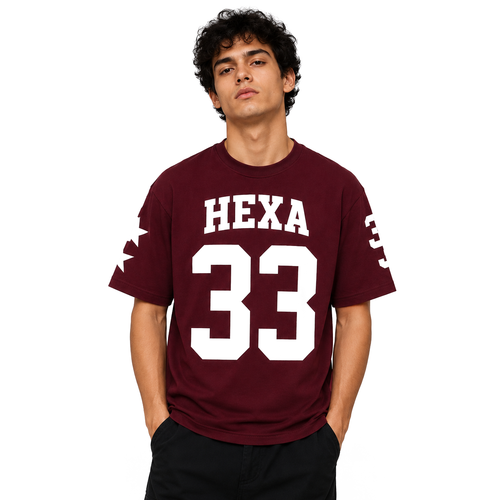 Hexa oversized baseball T-shirt in white with bold black lettering, relaxed fit style, front view showing the graphic design.