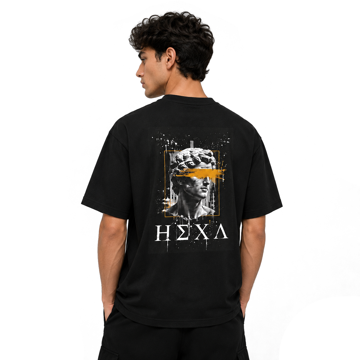 Black oversized T-shirt by HEXA with bold "Blind Vision" graphic print on front, casual fit, and short sleeves.